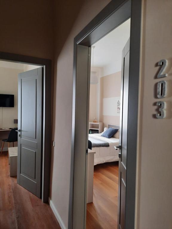 Postel nebo postele na pokoji v ubytování Art Hotel Pietrasanta