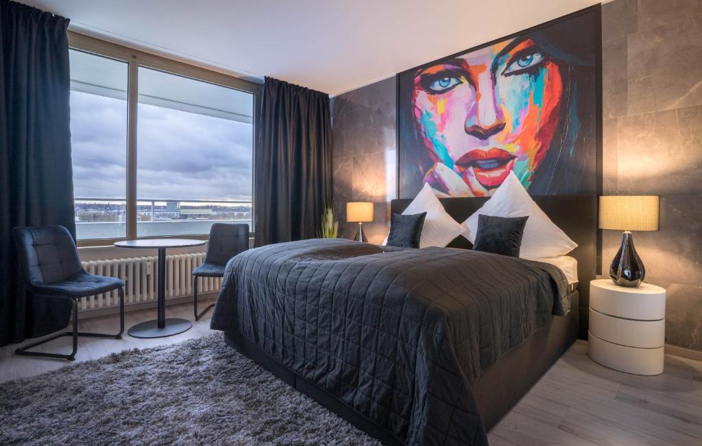 Postel nebo postele na pokoji v ubytování RüSuite III - Gemütliches Apartment in Essen