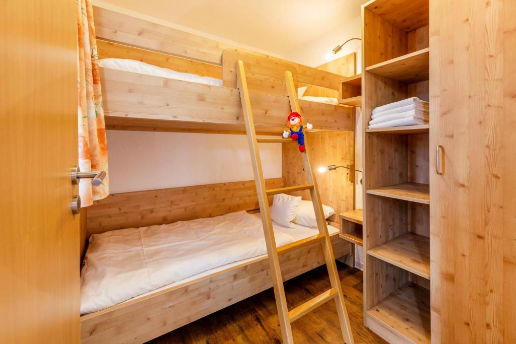 Postel nebo postele na pokoji v ubytování Hotel Engel - Familotel Hochschwarzwald