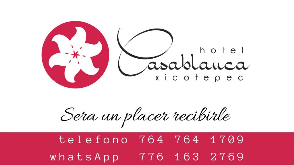 a label for a restaurant with a flower in the center at Hotel Casablanca Xicotepec in Xicotepec de Juárez