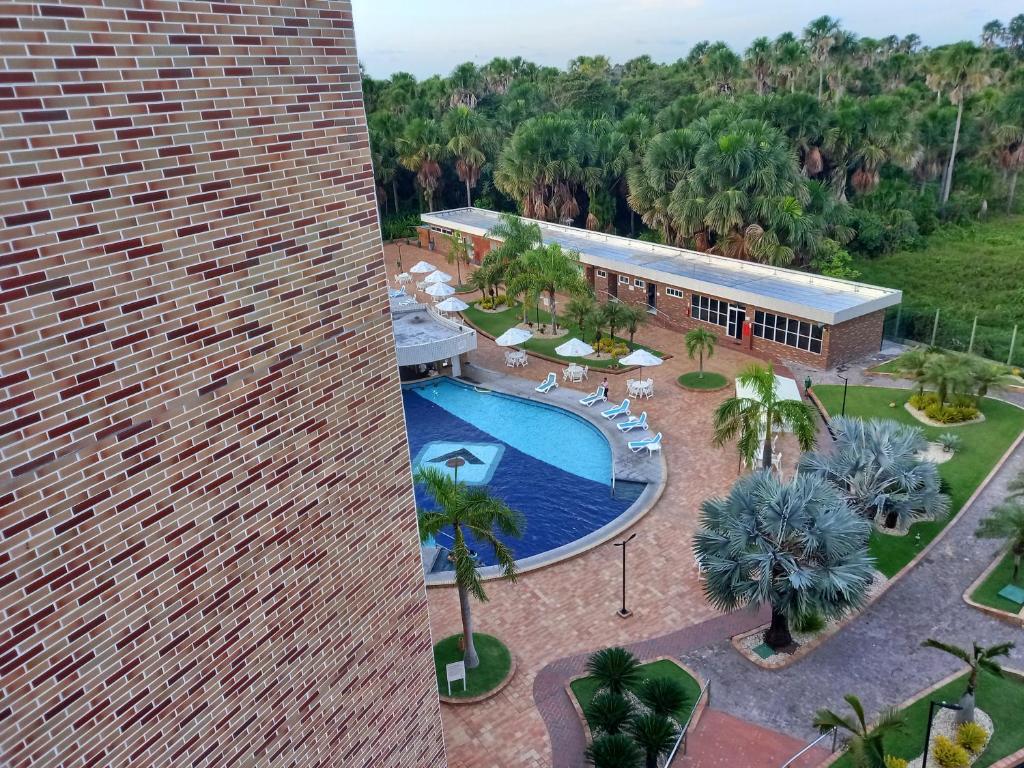 Bazén v ubytování Gran Lençóis Flat Residence nebo v jeho okolí