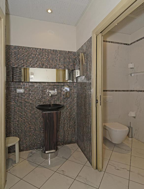 Koupelna v ubytování Hotel Eden