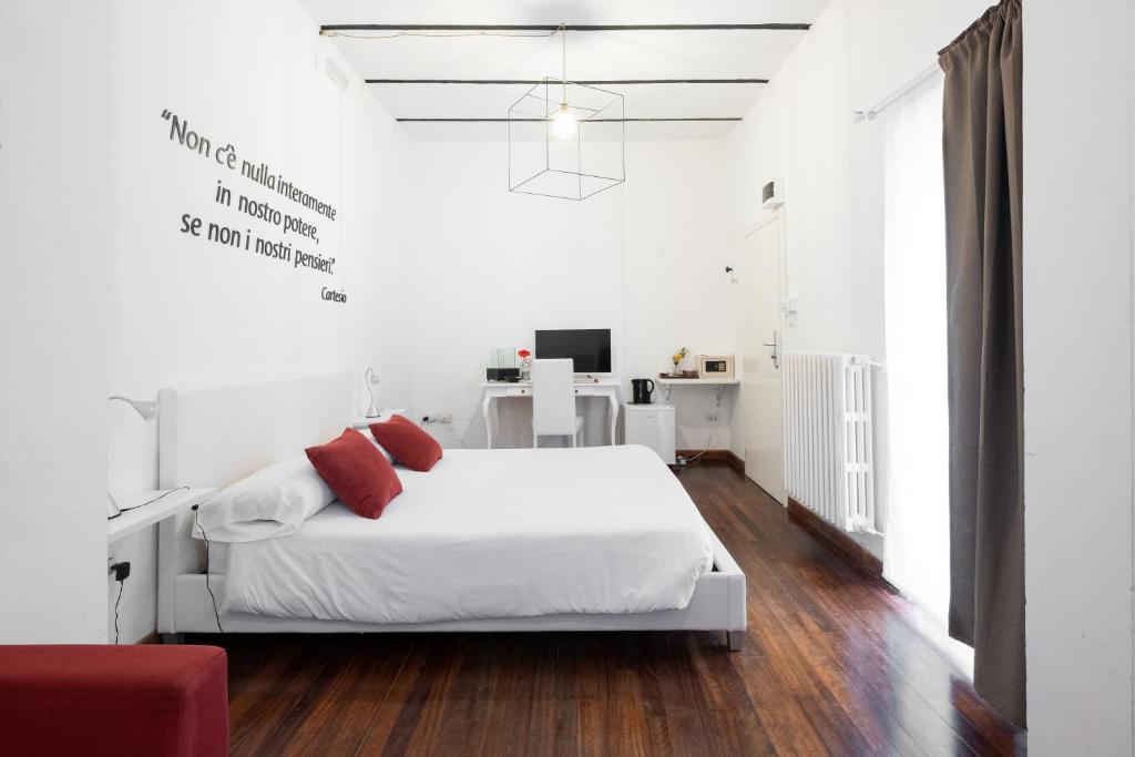 Postel nebo postele na pokoji v ubytování Ada Suites & Spa