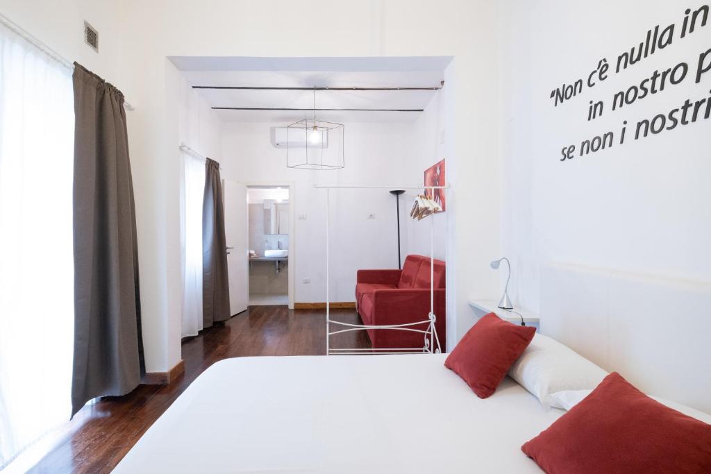 Postel nebo postele na pokoji v ubytování Ada Suites & Spa