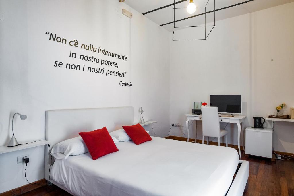 Postel nebo postele na pokoji v ubytování Ada Suites & Spa