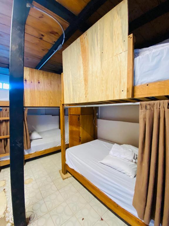 Postel nebo postele na pokoji v ubytování La Redonda Sayulita Hostal
