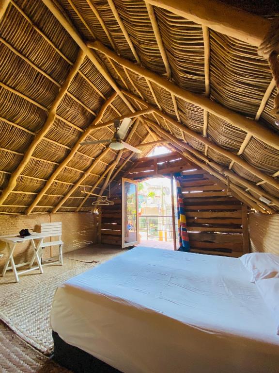Postel nebo postele na pokoji v ubytování La Redonda Sayulita Hostal