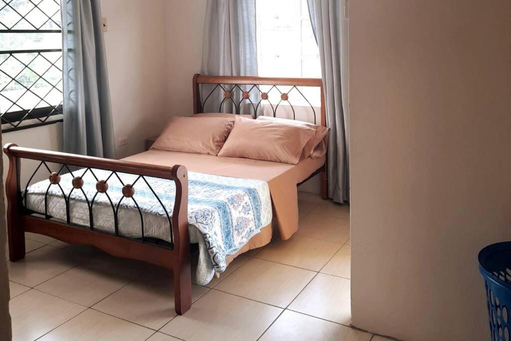 Postel nebo postele na pokoji v ubytování Mango Vert House