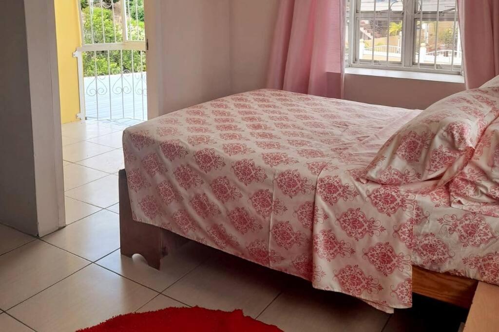 Postel nebo postele na pokoji v ubytování Mango Vert House