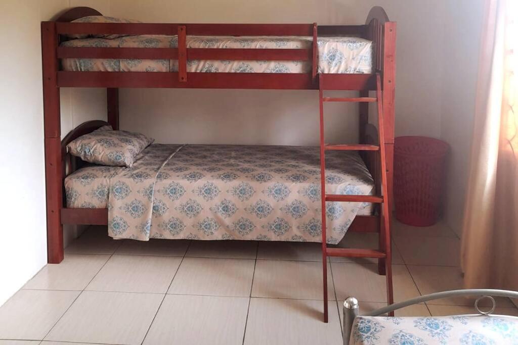 Postel nebo postele na pokoji v ubytování Mango Vert House