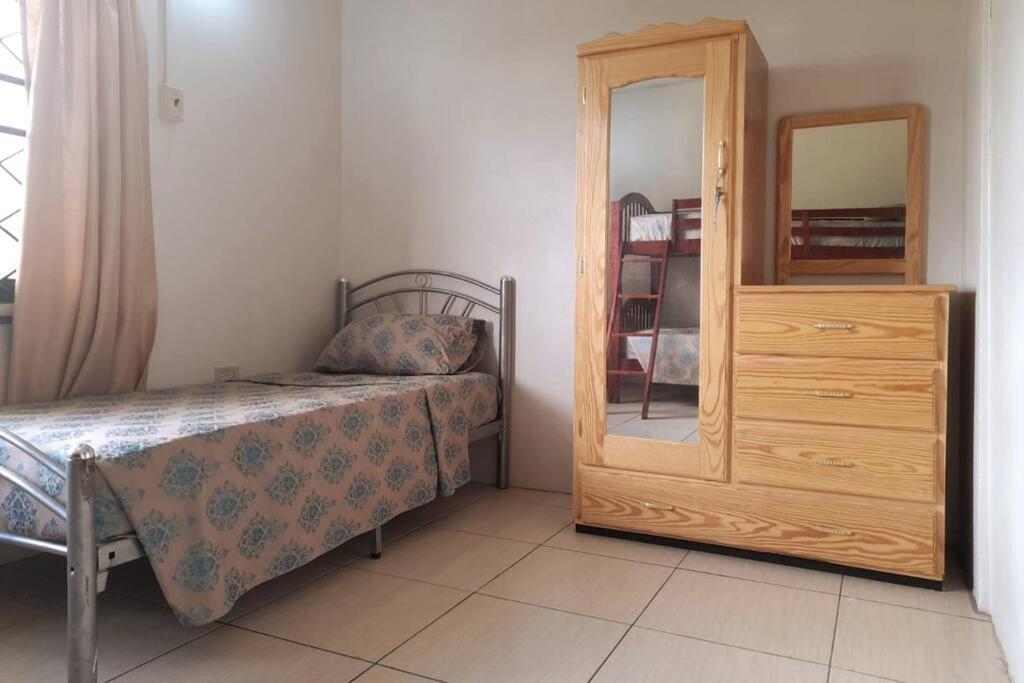 Postel nebo postele na pokoji v ubytování Mango Vert House