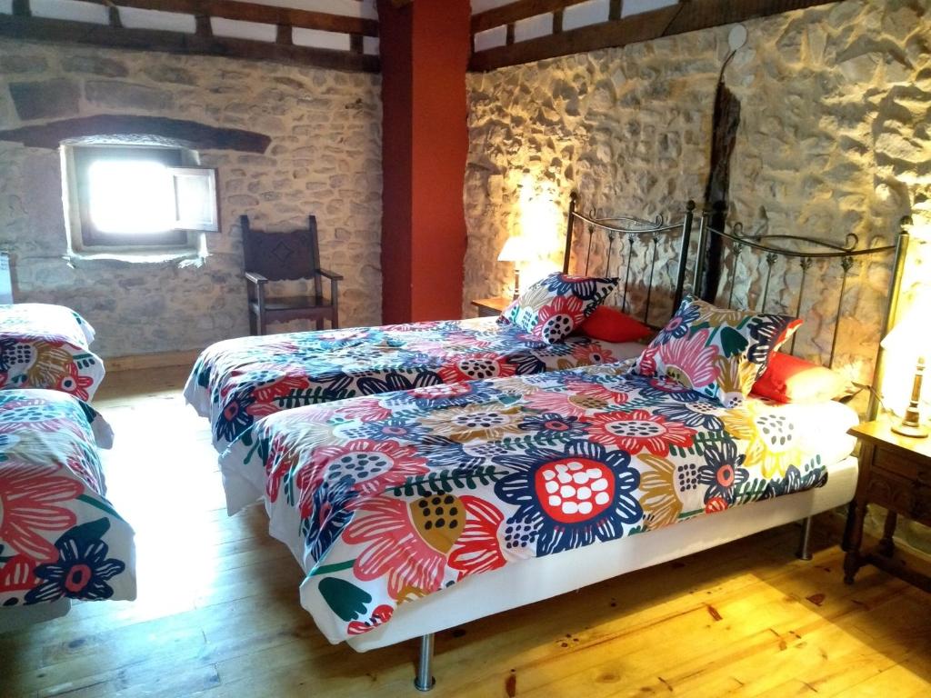 Postel nebo postele na pokoji v ubytování Don Baldomero Hotel Rural