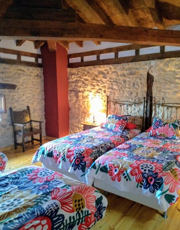 Postel nebo postele na pokoji v ubytování Don Baldomero Hotel Rural