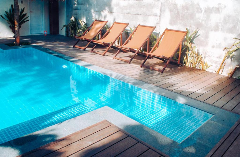 Bazén v ubytování MUNI MUNI VILLAS SIARGAO nebo v jeho okolí