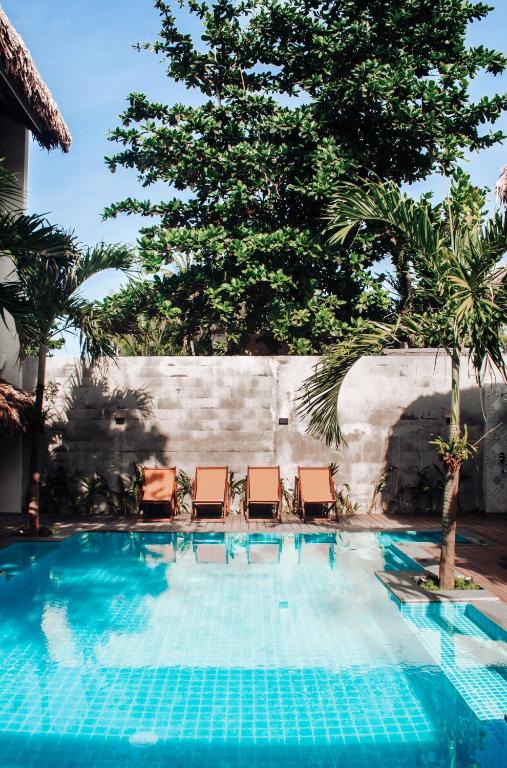 Bazén v ubytování MUNI MUNI VILLAS SIARGAO nebo v jeho okolí