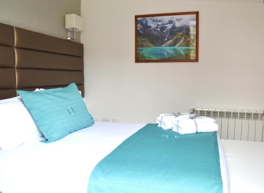 Postel nebo postele na pokoji v ubytování Katari Apart Hotel at Qorikancha