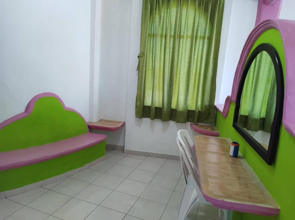 Posezení v ubytování Hotel Real del Quijote a sólo 50 metros de la playa