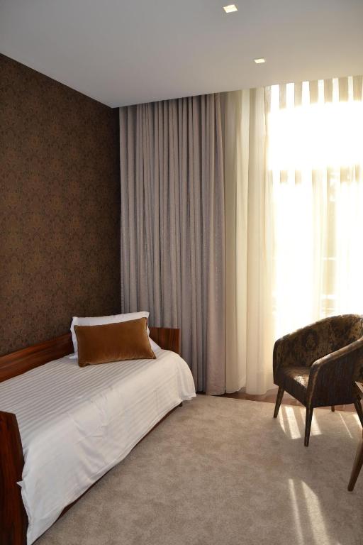 Postel nebo postele na pokoji v ubytování Hotel do Parque