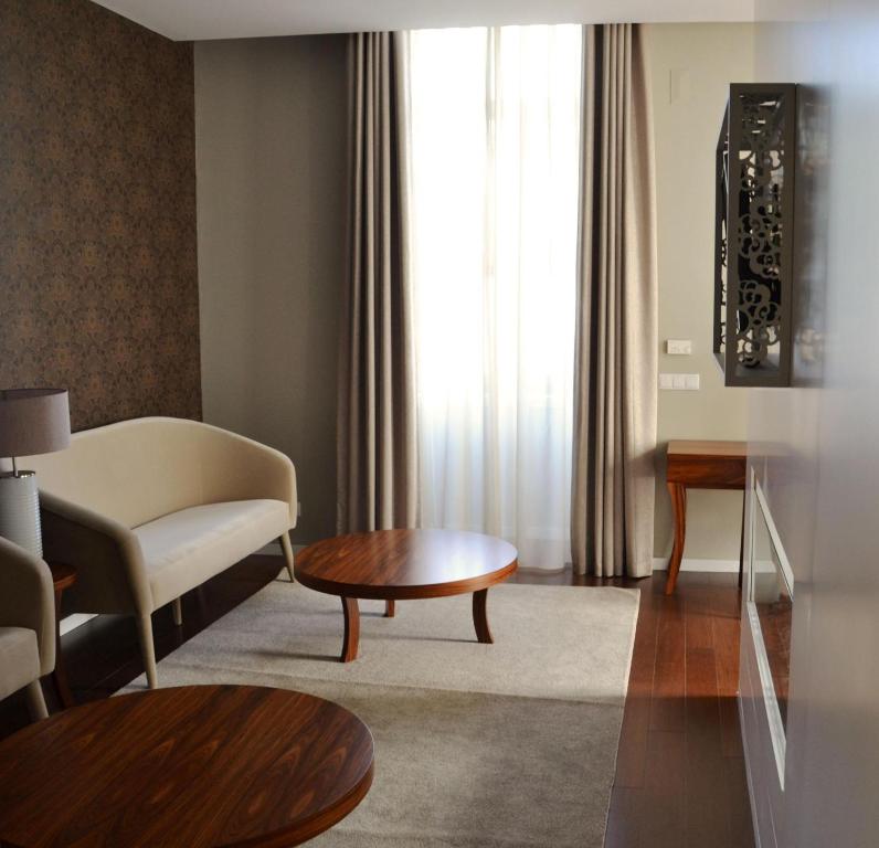 Posezení v ubytování Hotel do Parque