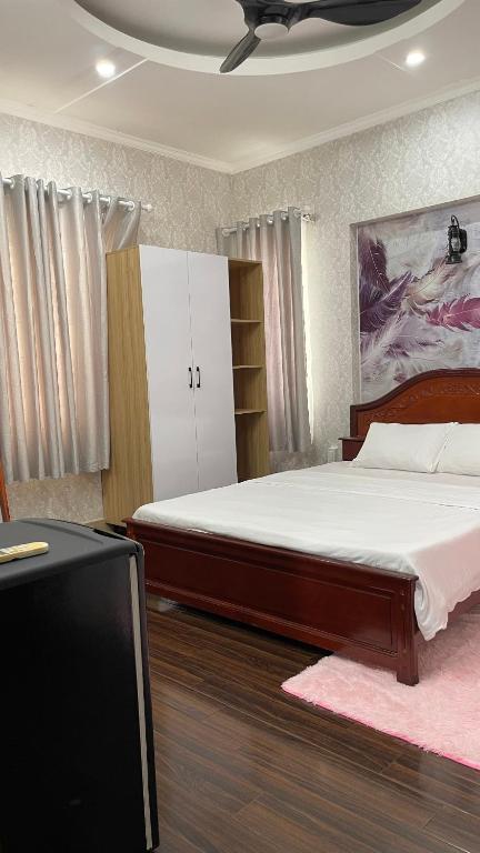 Postel nebo postele na pokoji v ubytování Sampan House