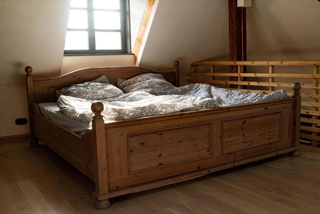 Llit o llits en una habitació de Schloss-Muehlen
