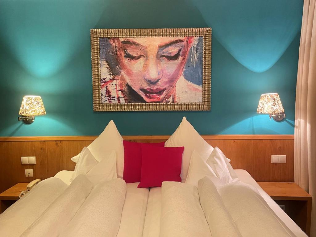 Postel nebo postele na pokoji v ubytování Hotel Dr Otto Murr B&B