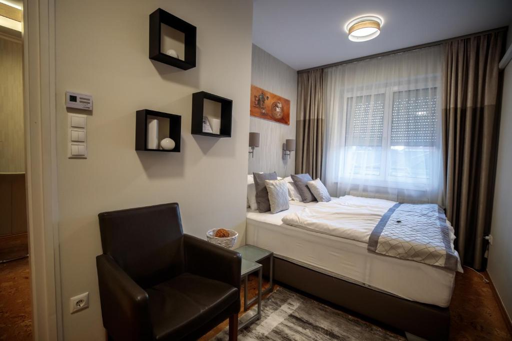 Posteľ alebo postele v izbe v ubytovaní Mokka Best Apartments