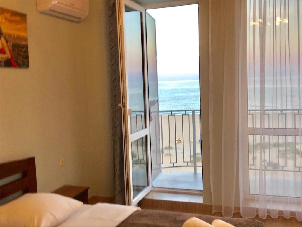 Postel nebo postele na pokoji v ubytování Hotel Golden Beach