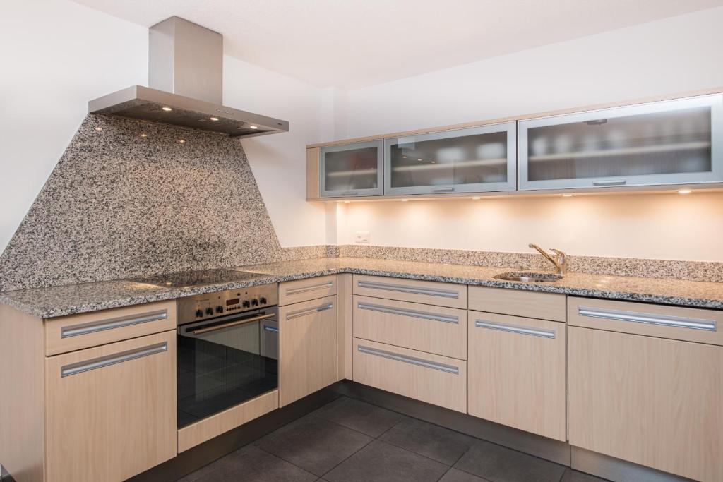Kuchyň nebo kuchyňský kout v ubytování Ferienhaus Matterhorngruss
