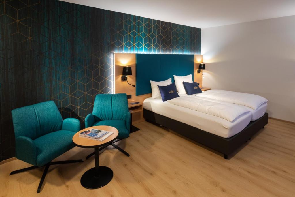 Voodi või voodid majutusasutuse Hotel Messmer toas
