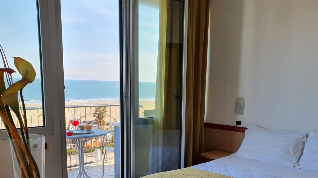 Postel nebo postele na pokoji v ubytování Hotel Tilmar