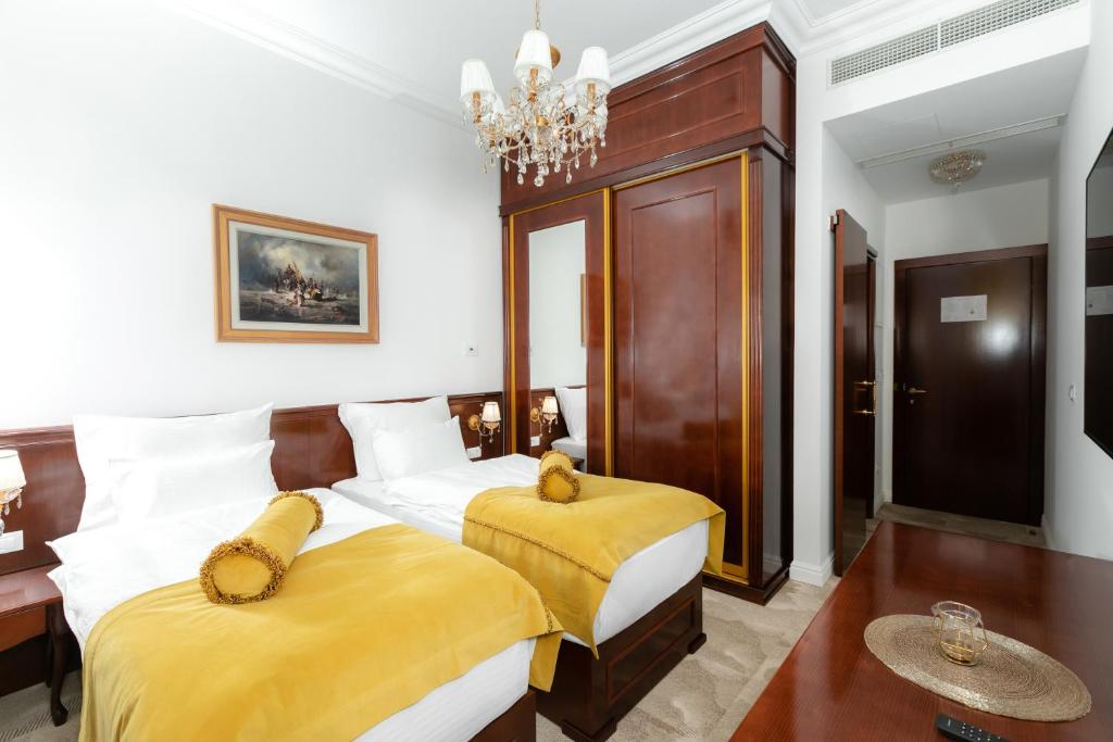 Postel nebo postele na pokoji v ubytování Hotel Integra Banja Luka