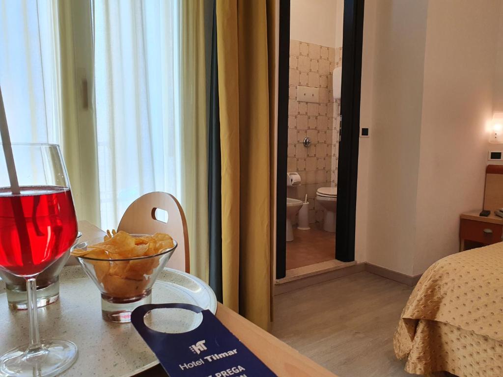 Postel nebo postele na pokoji v ubytování Hotel Tilmar