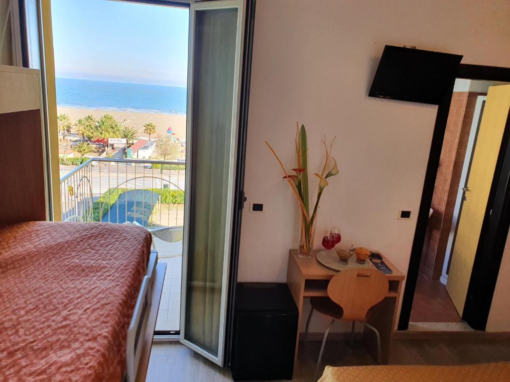 Postel nebo postele na pokoji v ubytování Hotel Tilmar