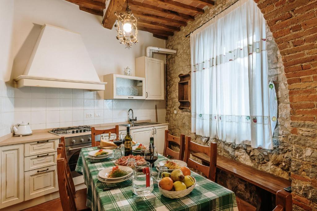 Kuchyň nebo kuchyňský kout v ubytování Borgo Villa a Sesta