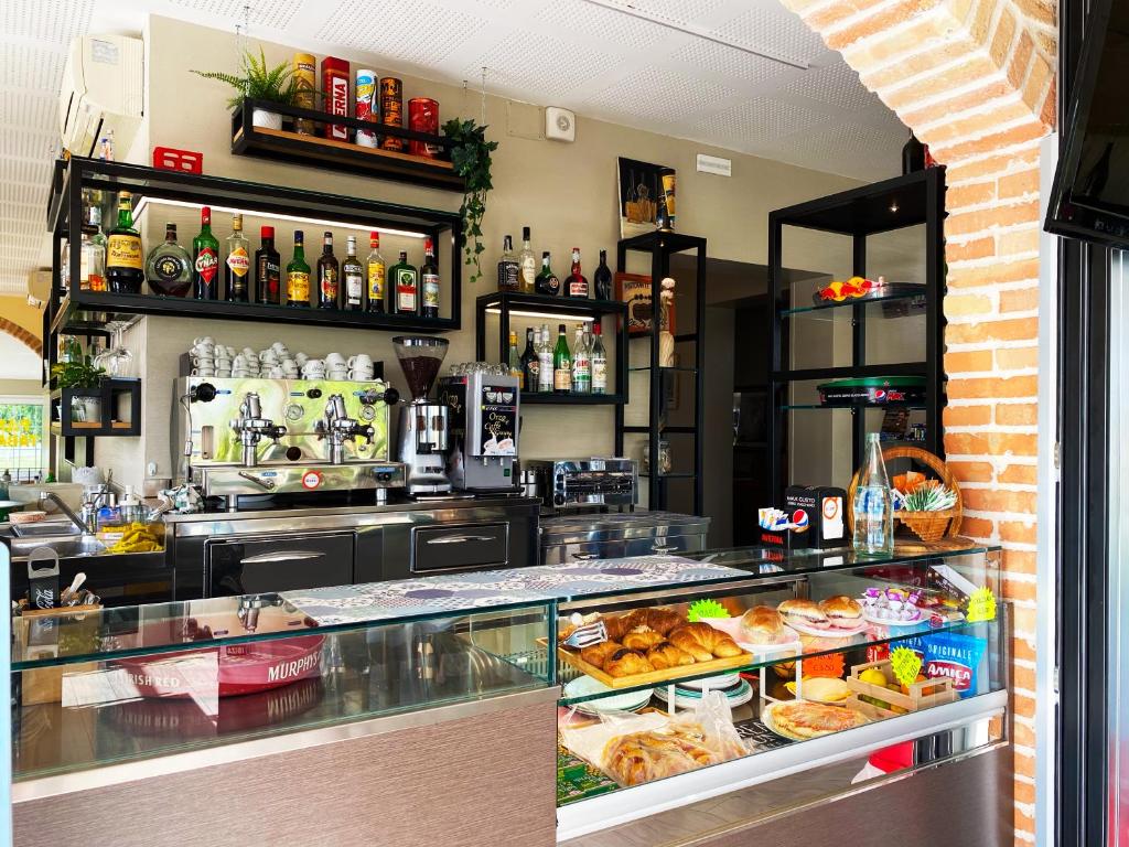Nápoje v ubytovaní Le 3 Botti Locanda