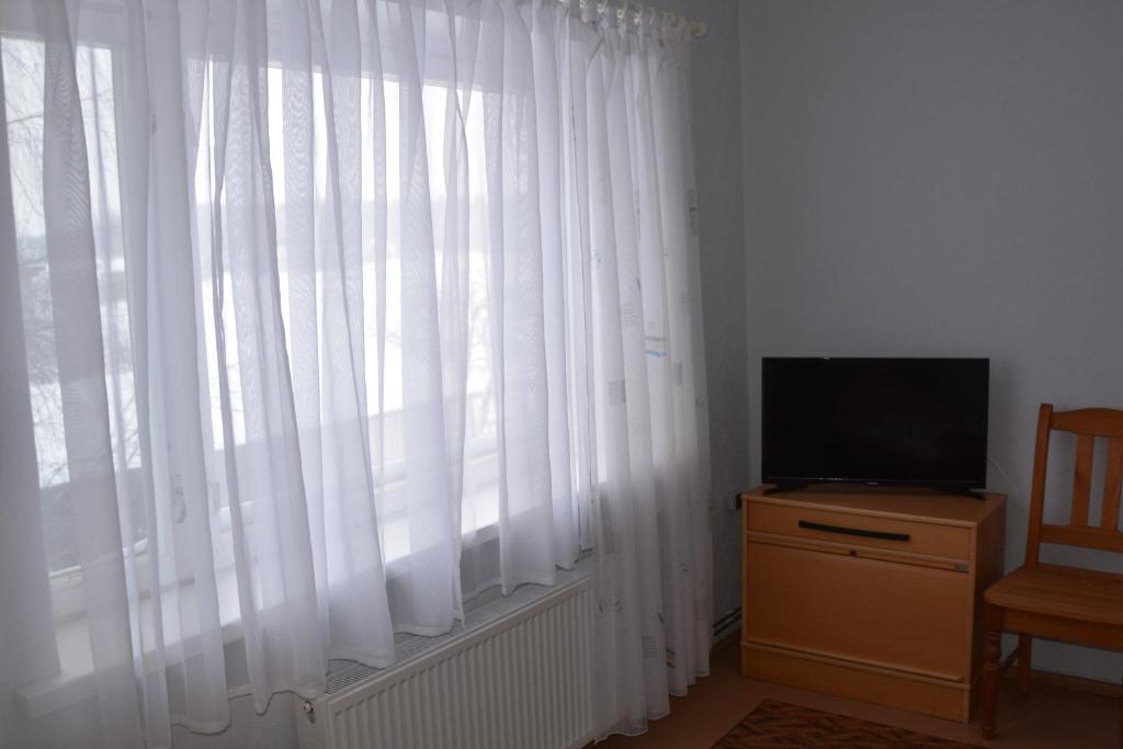 TV a/nebo společenská místnost v ubytování K15HOSTEL guest apartments