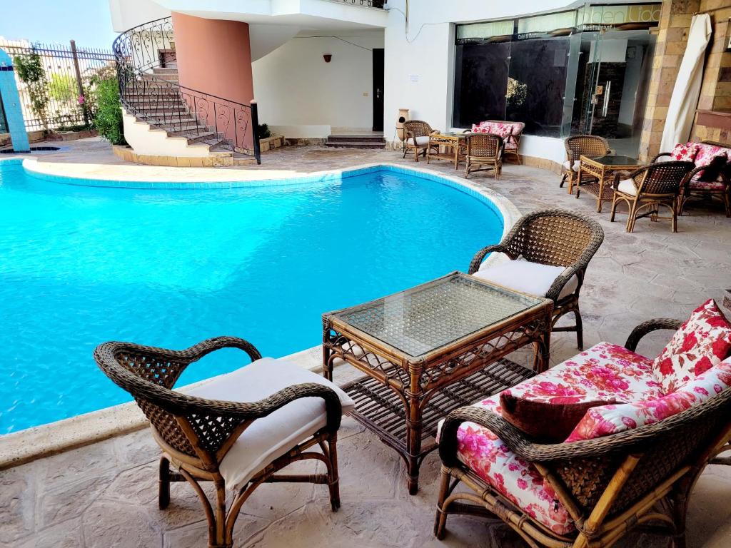 Bazén v ubytování Oasis marsa alam nebo v jeho okolí