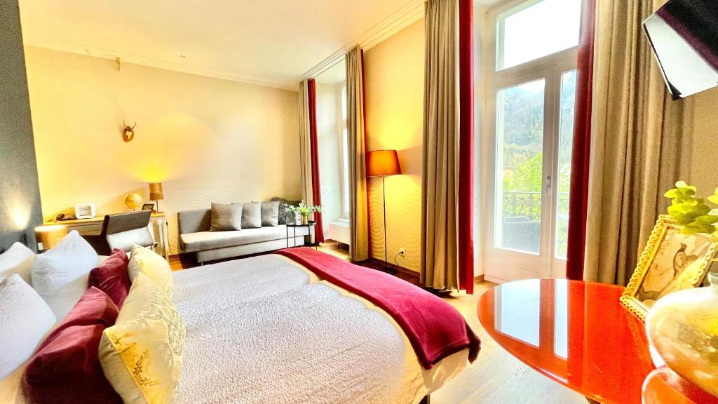 Postel nebo postele na pokoji v ubytování Parkhotel du Sauvage