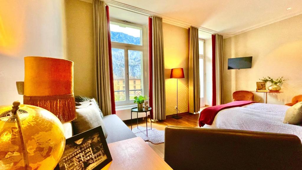 TV a/nebo společenská místnost v ubytování Parkhotel du Sauvage