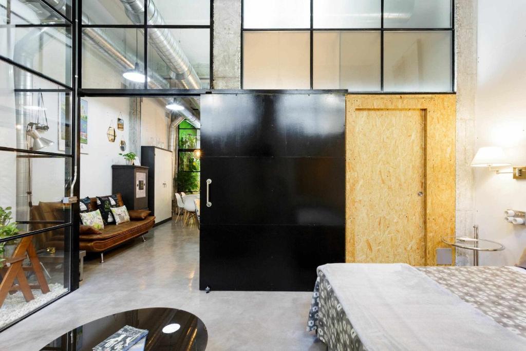 Postel nebo postele na pokoji v ubytování MonKeys Apartments Luxury MetaLoft
