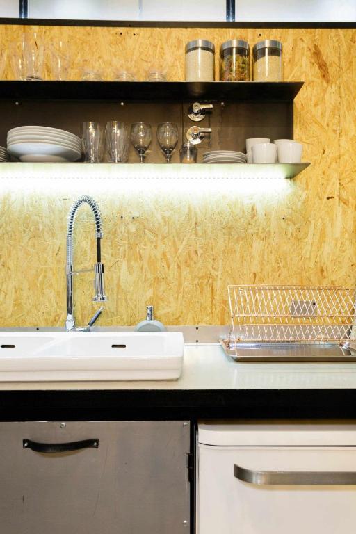 Kuchyň nebo kuchyňský kout v ubytování MonKeys Apartments Luxury MetaLoft