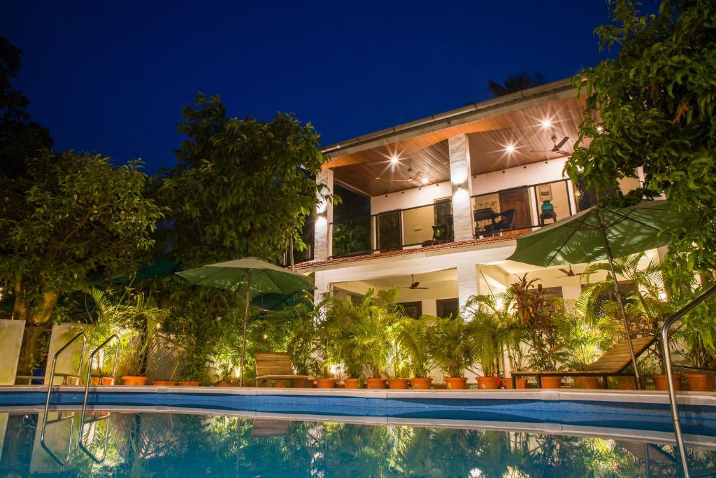 Bazén v ubytování Sanidhya Beach Resort nebo v jeho okolí