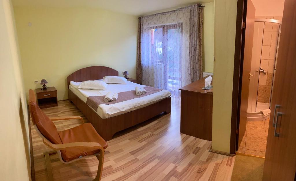 Postel nebo postele na pokoji v ubytování Green Mountain Resort