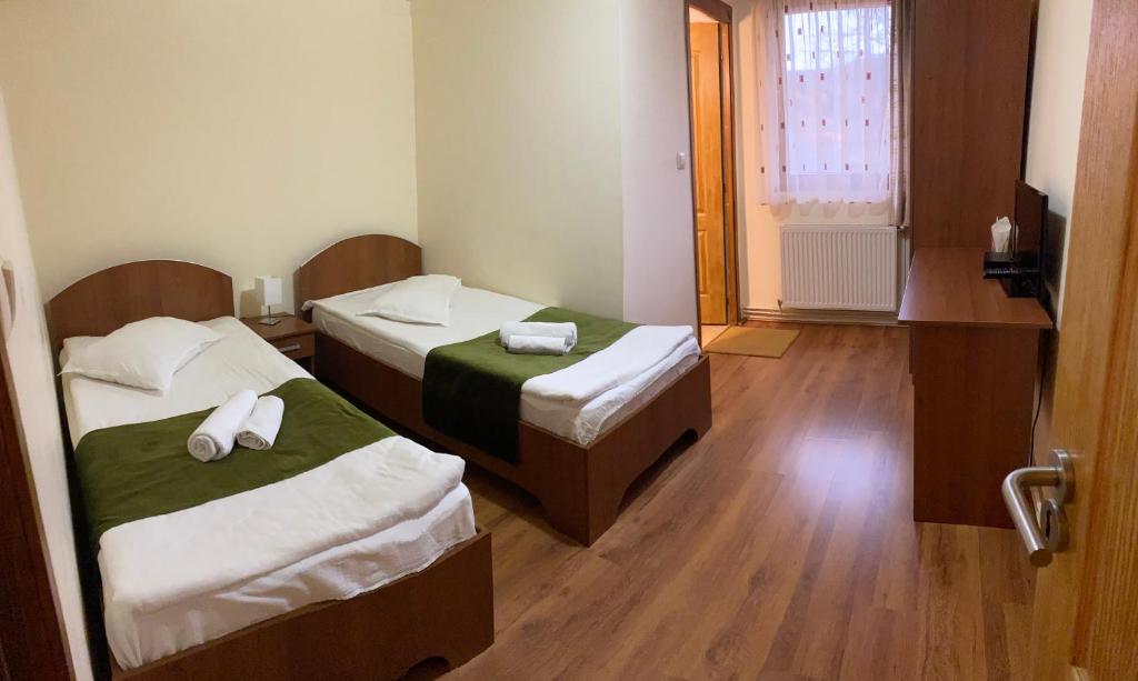 Postel nebo postele na pokoji v ubytování Green Mountain Resort