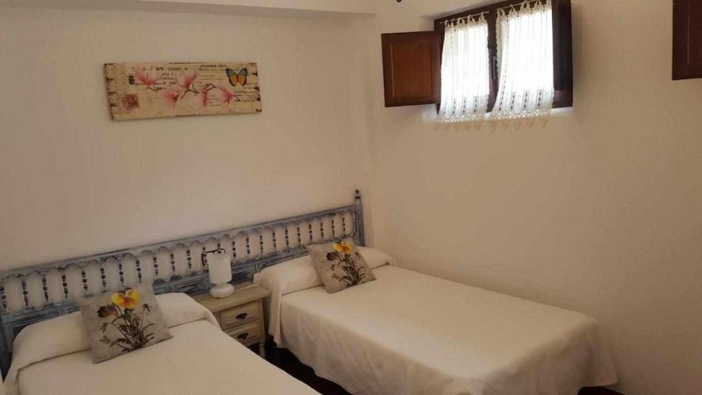 Cama o camas de una habitación en Apartamentos Nevandi
