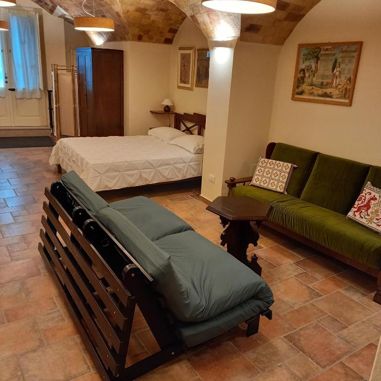 Postel nebo postele na pokoji v ubytování La Cisterna del Vicinato