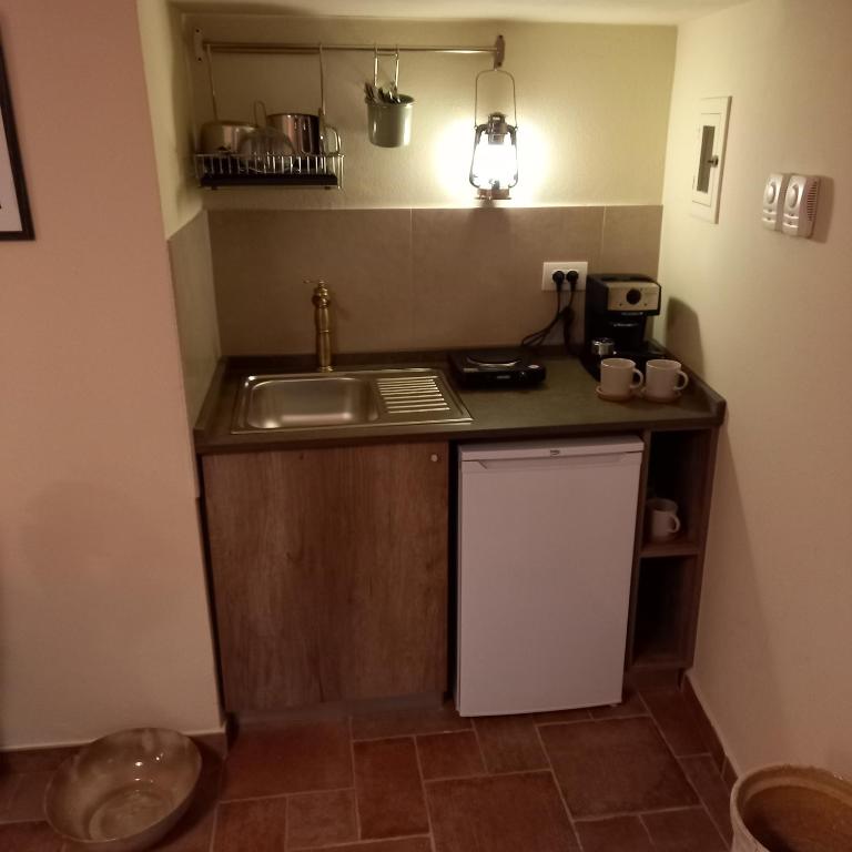 Kuchyň nebo kuchyňský kout v ubytování La Cisterna del Vicinato