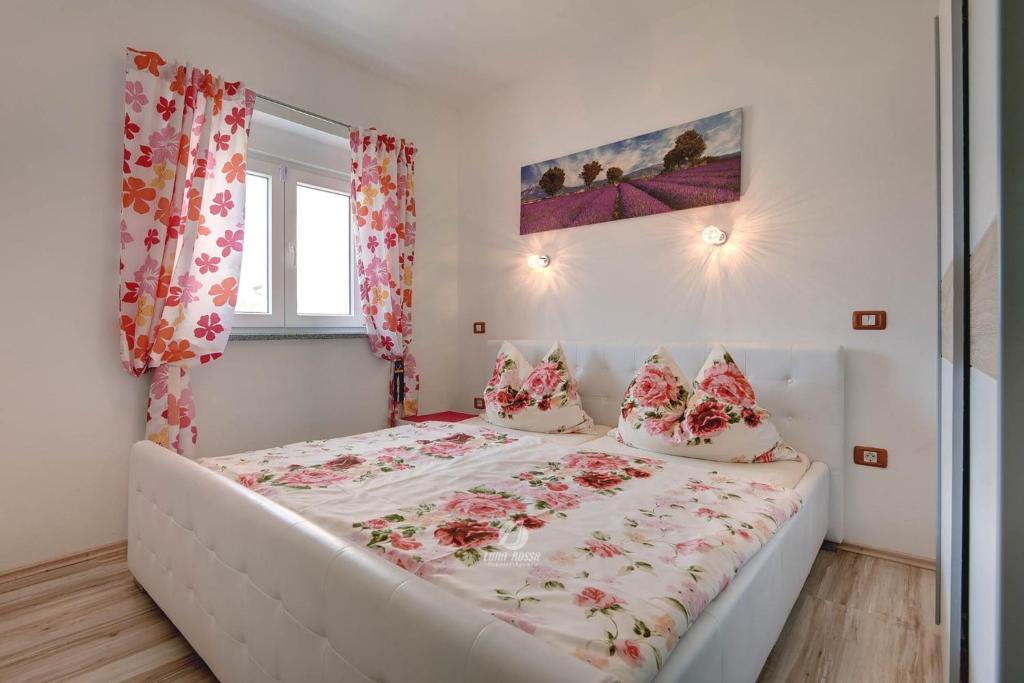 Łóżko lub łóżka w pokoju w obiekcie Villa Brcina