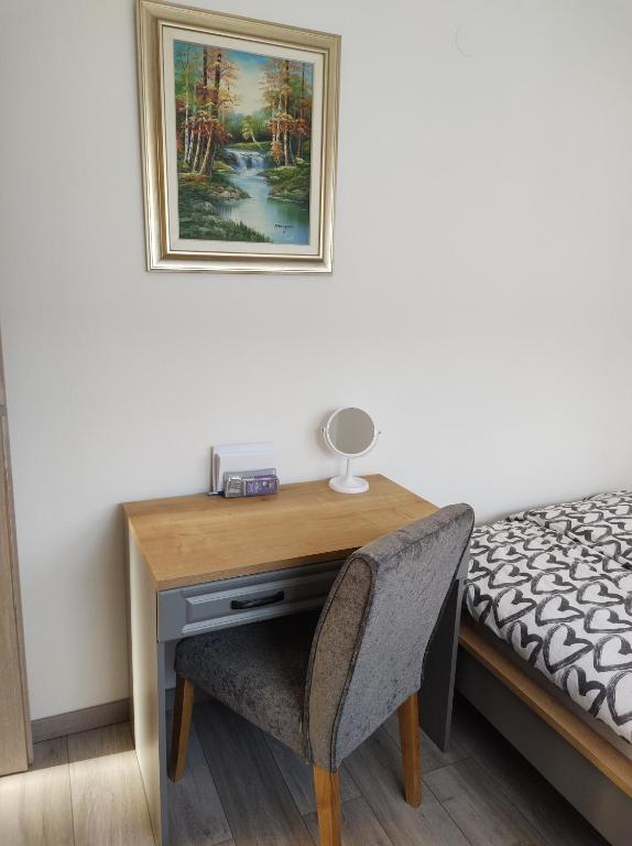 Postel nebo postele na pokoji v ubytování Happy Apartment